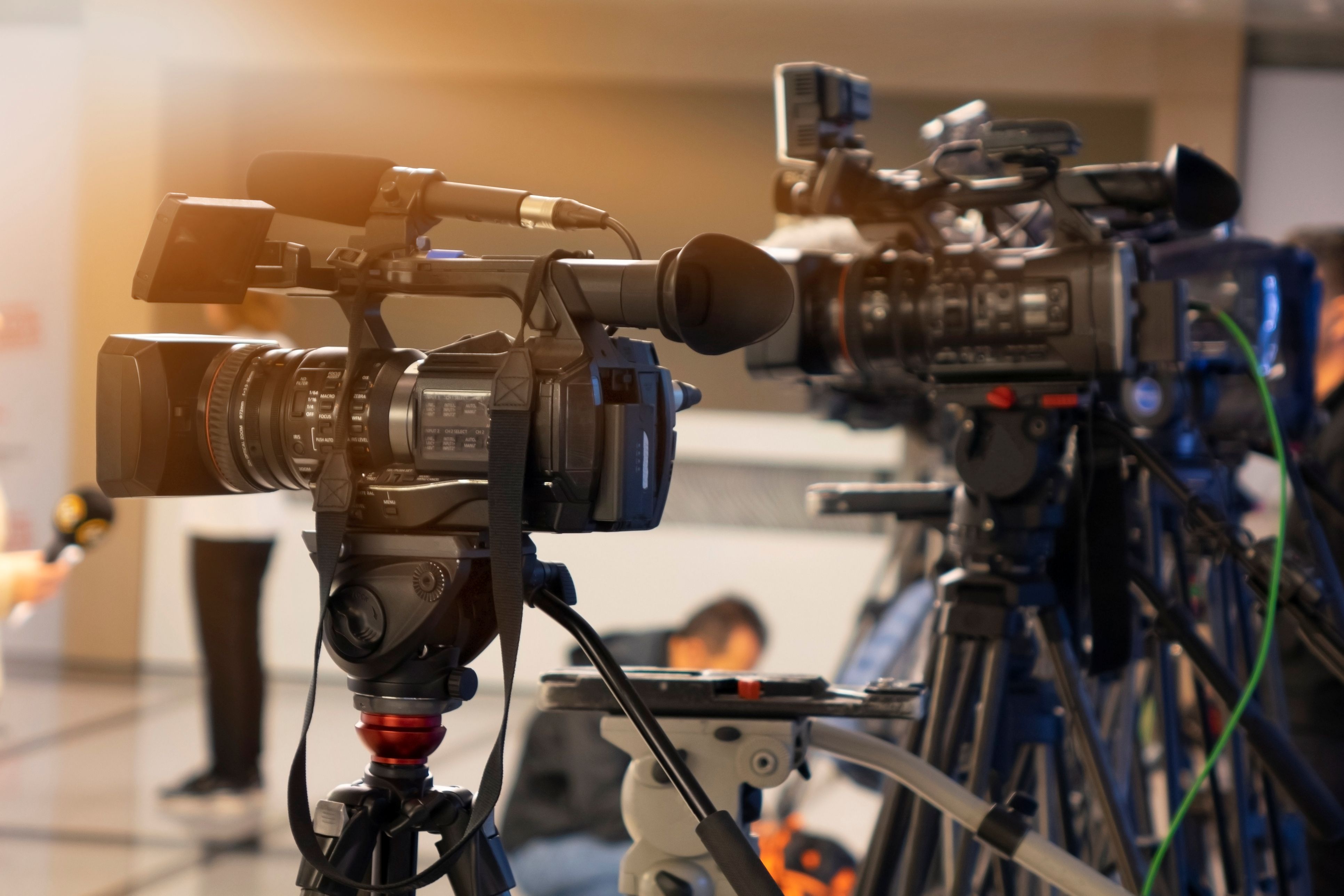 Media cameras at a press conference