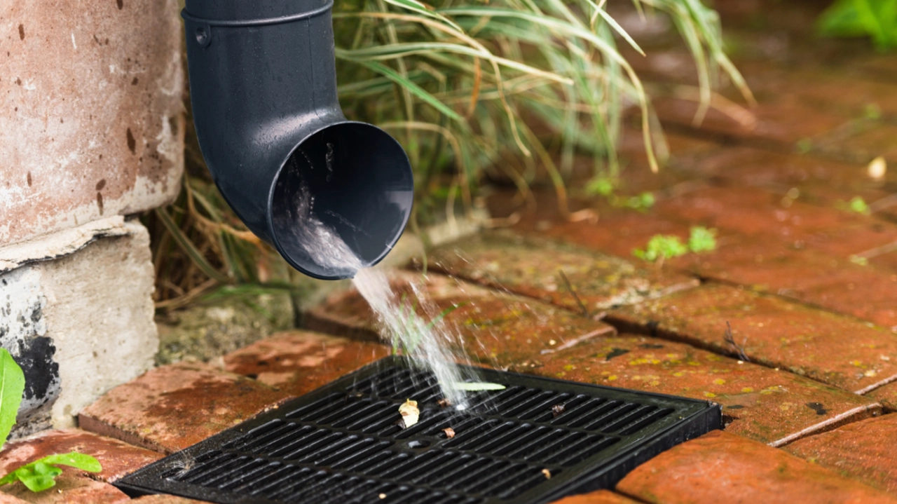 Water pouring from gutter