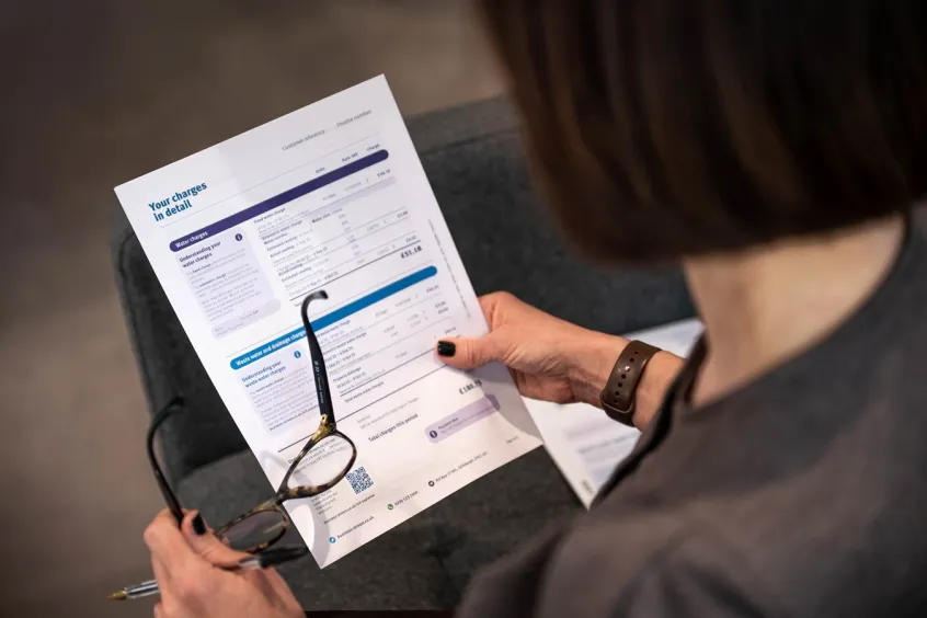 Woman examining her bill