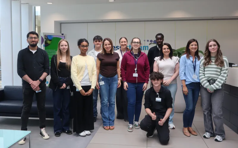 Group of young people and colleagues in reception